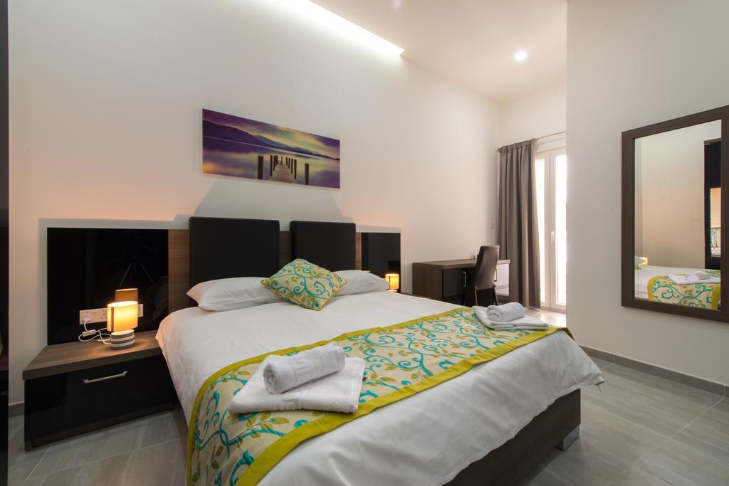 Hacienda Apartments Слима Экстерьер фото