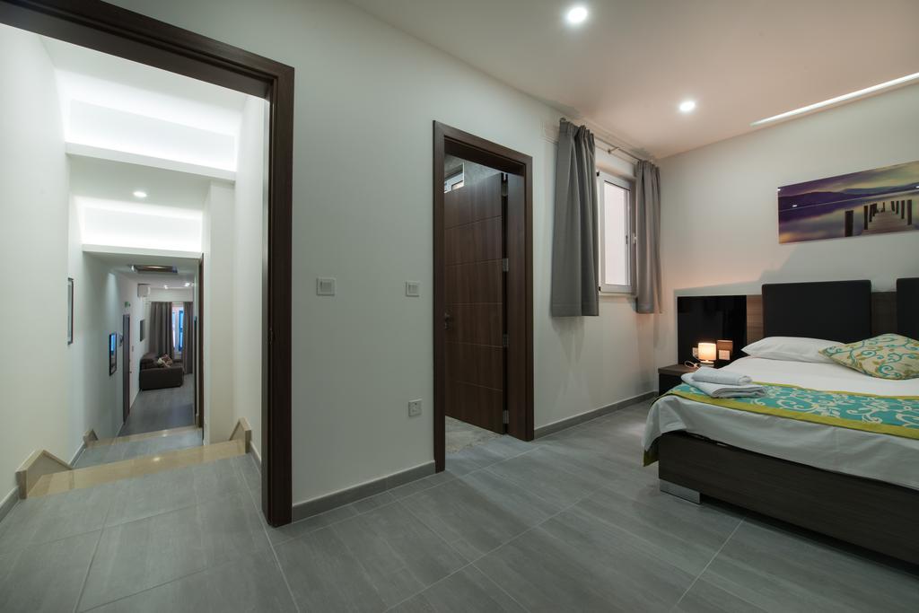Hacienda Apartments Слима Экстерьер фото