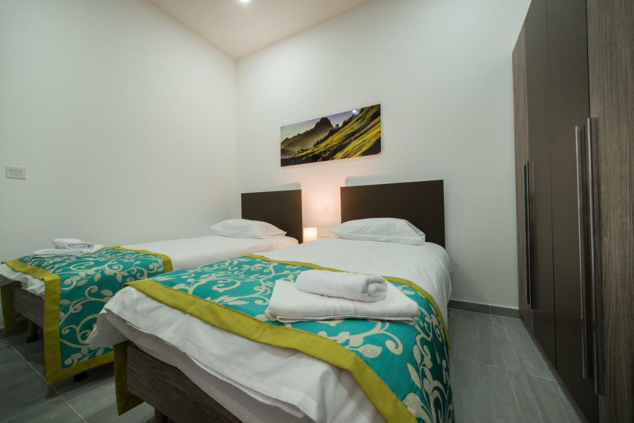 Hacienda Apartments Слима Экстерьер фото