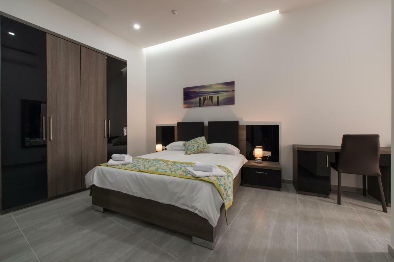 Hacienda Apartments Слима Экстерьер фото